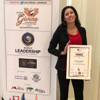 Dr Silvia Vianello (Director of Innovation Centre, SP Jain Dubai) receives the Middle East Women Leadership Award