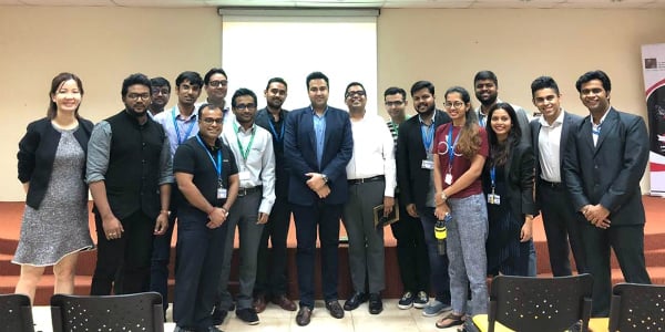 Mr. Kiran Pradhan, an SP Jain GMBA Alum and Head of Analytics and Strategy, Global Supply Chain Analytics
at Schneider Electric (centre, in white) with SP Jain staff and postgraduate students